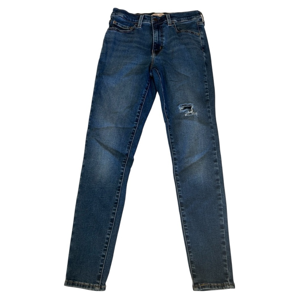Levi’s 720 high rise super skinny medium wash slightly distressed jeans